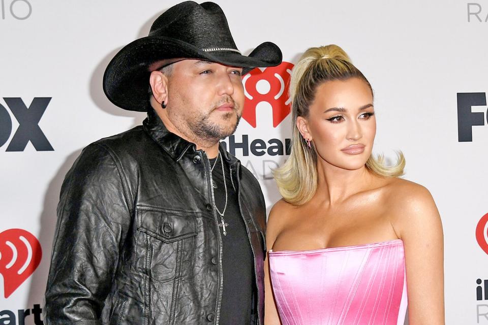 LOS ANGELES, CALIFORNIA - MARCH 22: (FOR EDITORIAL USE ONLY) (L-R) Jason Aldean and Brittany Kerr attend the 2022 iHeartRadio Music Awards at The Shrine Auditorium in Los Angeles, California on March 22, 2022. Broadcasted live on FOX. (Photo by JC Olivera/Getty Images for iHeartRadio)