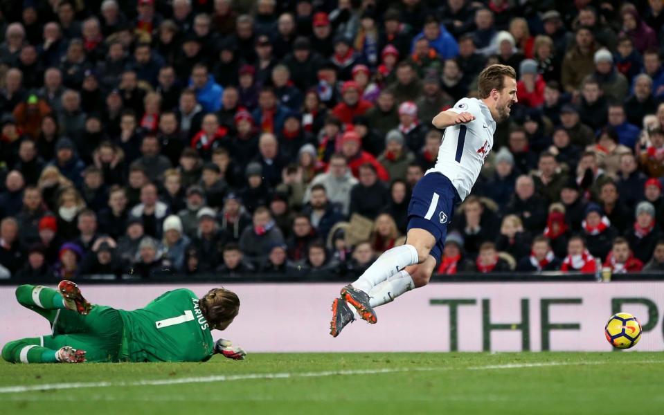 Harry Kane fell in the box to win a late penalty for Tottenham at Anfield on Sunday