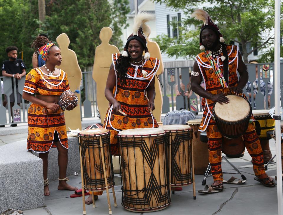 Members of the Akwaaba Ensemble perform at the Portsmouth African Burying Ground during last year's Juneteenth ceremony in Portsmouth.