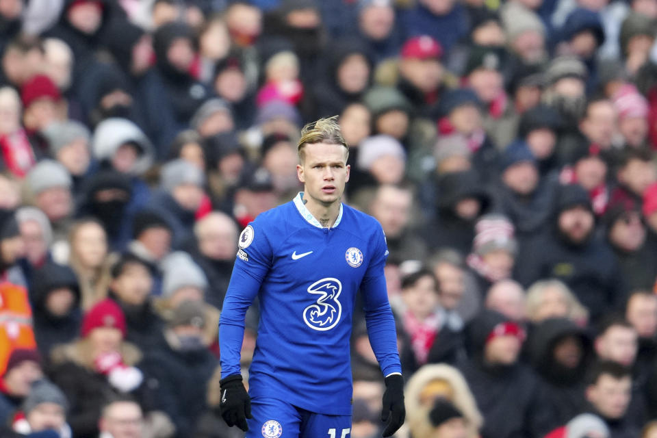 Chelsea's Mykhailo Mudryk enters the pitch after he replaced Chelsea's Lewis Hall during the English Premier League soccer match between Liverpool and Chelsea at Anfield stadium in Liverpool, England, Saturday, Jan. 21, 2023. (AP Photo/Jon Super)