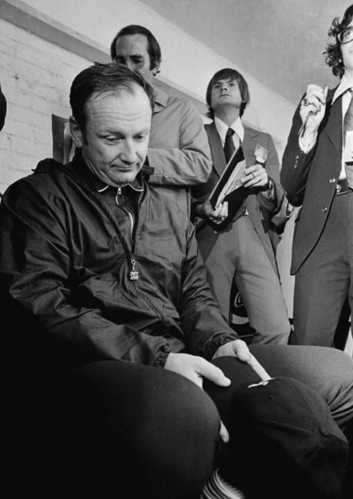 FILE – Michigan football coach Bo Schembechler bows his head as he is interviewed after a 10-10 tie against Ohio State in Ann Arbor, Mich., Nov. 24, 1973. To determine which team got the Rose Bowl bid, Big Ten athletic directors voted and Ohio State won. Schembechler was furious and never fully got over being snubbed. (AP Photo/File)