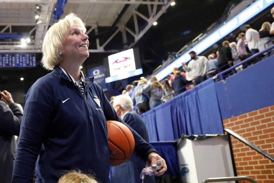 Sacred Heart head coach Donna Moir looks to the crowd after the Valkyries’ 49-47 victory. “I just never thought that we’d be back here, because I’ve had some good teams and had a lot of bad luck.”