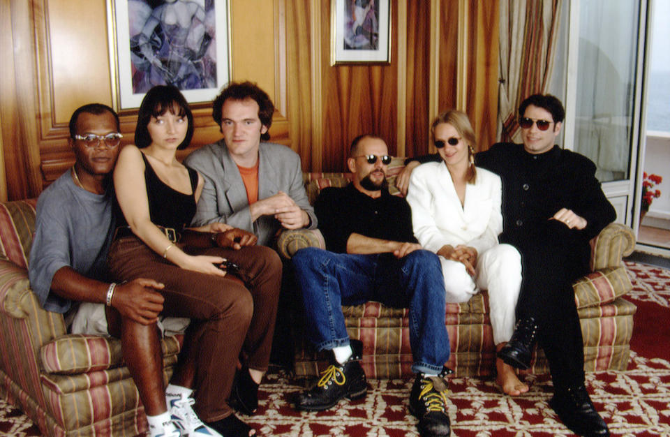 Quentin Tarantino with the cast of Pulp Fiction