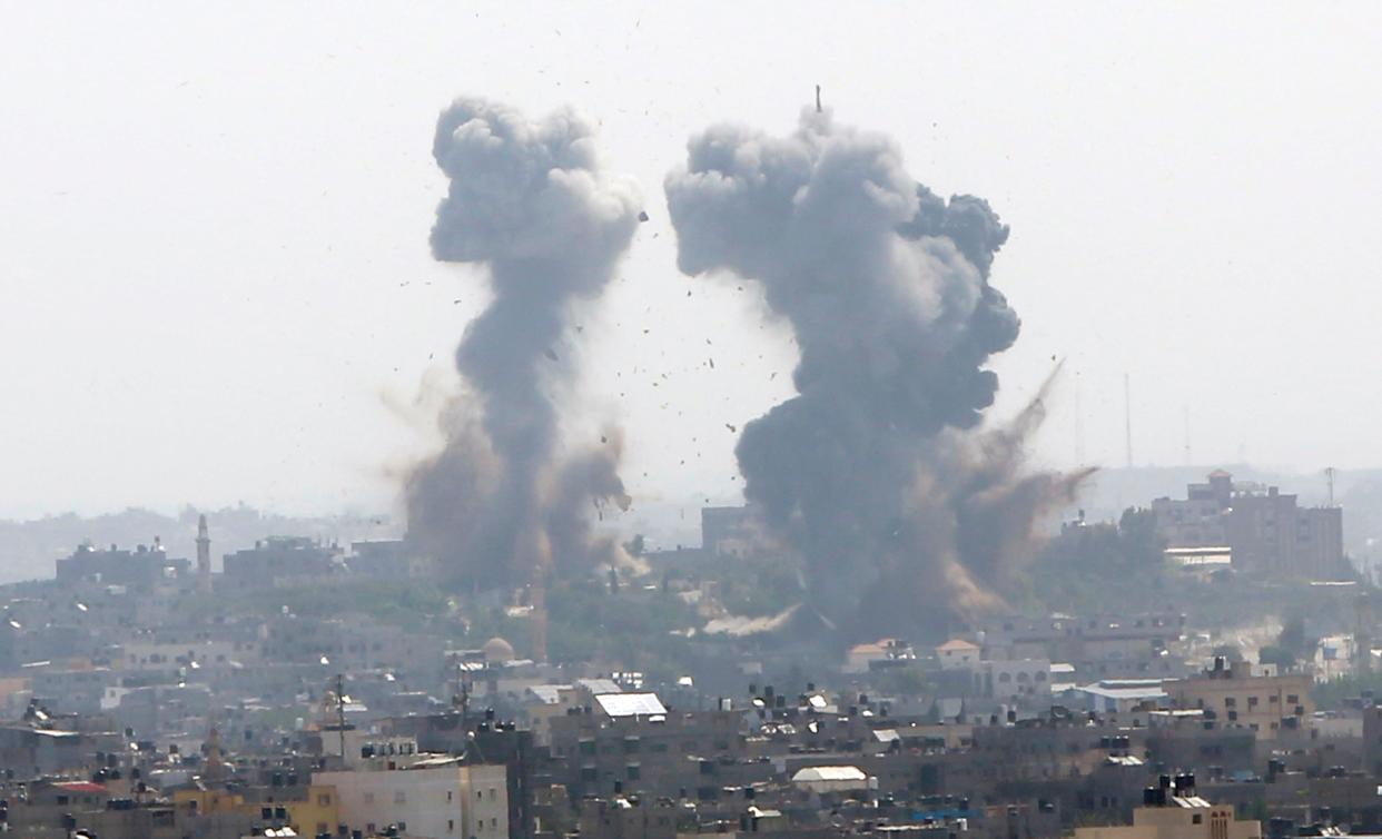 Smoke rises after an Israeli forces strike in Gaza in Gaza City, Tuesday, May 11, 2021.