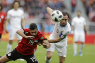 <p>Uruguay’s Diego Godin, right, challenges for the ball with Egypt’s Abdalla Said during the group A clash. (AP) </p>