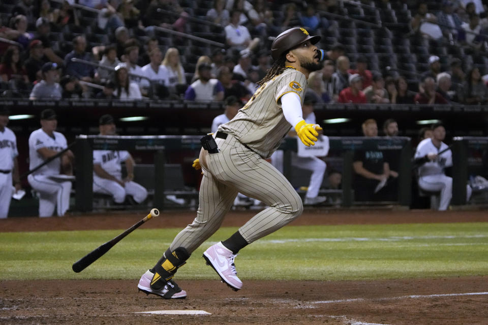 San Diego Padres' Fernando Tatis Jr. flies out against the Arizona Diamondbacks during the fifth inning of a baseball game, Thursday, April 20, 2023, in Phoenix. (AP Photo/Rick Scuteri)