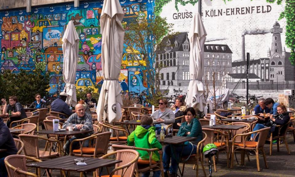 A pavement cafe in the city centre.