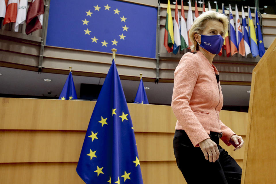 European Commission President Ursula von der Leyen arrives at the plenary ahead of her first State of the Union speech at the European Parliament in Brussels, Wednesday, Sept. 16, 2020. European Commission President Ursula von der Leyen will set out her vision of the future in her first State of the European Union address to the EU legislators. Weakened by the COVID-19 pandemic and the departure of the United Kingdom, she will center her speech on how the bloc should adapt to the challenges of the future, including global warming, the switch to a digital economy and immigration. (Olivier Hoslet, Pool via AP)