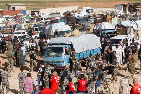 Syrian refugees prepare to return to Syria from the Lebanese border town of Arsal, Lebanon June 28, 2018. REUTERS/Mohamed Azakir