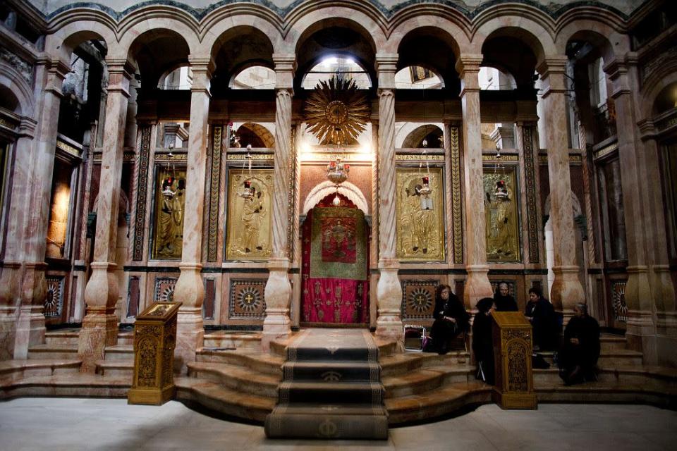 Christian pilgrims at Church of the Holy Sepulcher during the Good Friday procession in 2011 in Jerusalem, Israel. In Jerusalem Christian pilgrims took part in processions along the route that Jesus is believed to have taken in his last days as he carried the cross.