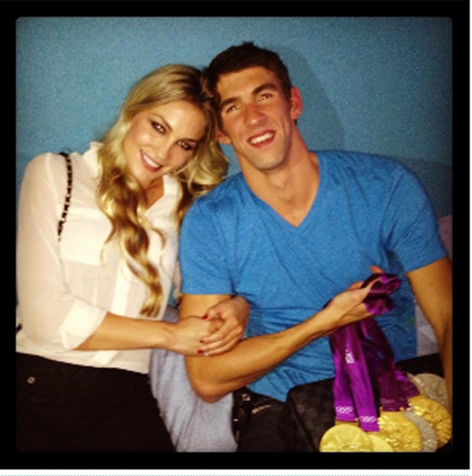 Megan Rossee tweets this image of herself and Michael Phelps