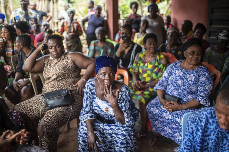 People gather to observe vote counting at a polling station during the presidential elections in Agulu, Nigeria, Saturday, Feb. 25, 2023. Voters in Africa's most populous nation are heading to the polls Saturday to choose a new president, following the second and final term of incumbent Muhammadu Buhari. (AP Photo/Mosa'ab Elshamy)