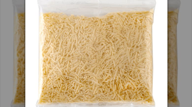 Clear plastic bag of shredded cheese