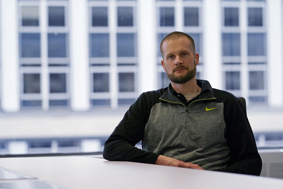 In this Dec. 31, 2020, file photo pardoned Blackwater contractor Evan Liberty poses for a photo in Washington. Liberty is one of four former Blackwater contractors pardoned by President Donald Trump in one of his final acts in office, wiping away their convictions in a 2007 shooting rampage in Baghdad that killed more than a dozen Iraqi civilians. The pardons were met with intense condemnation both in the United States and the Middle East. (AP Photo/Susan Walsh)