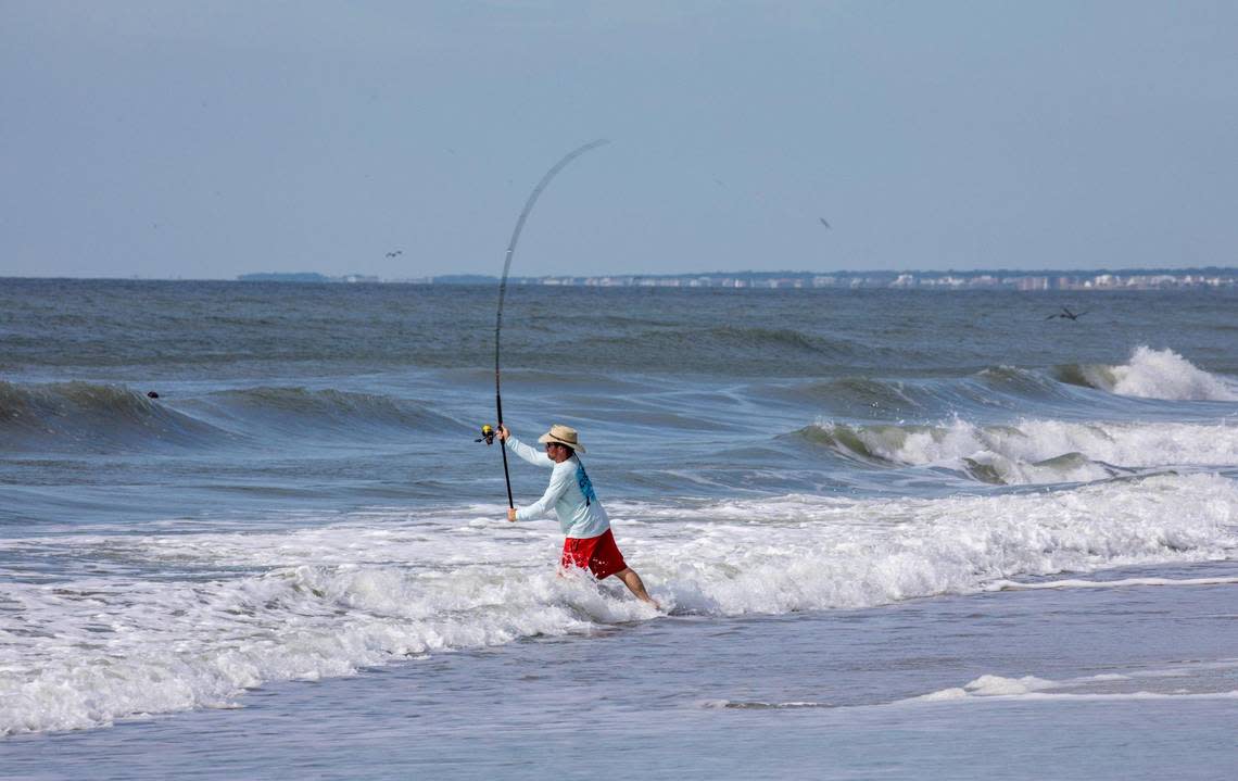 A surf fisherman cast his line at Huntington Beach State Park in Murrells Inlet, S.C. Fishing locations along the Grand Strand. File. July 14, 2022.