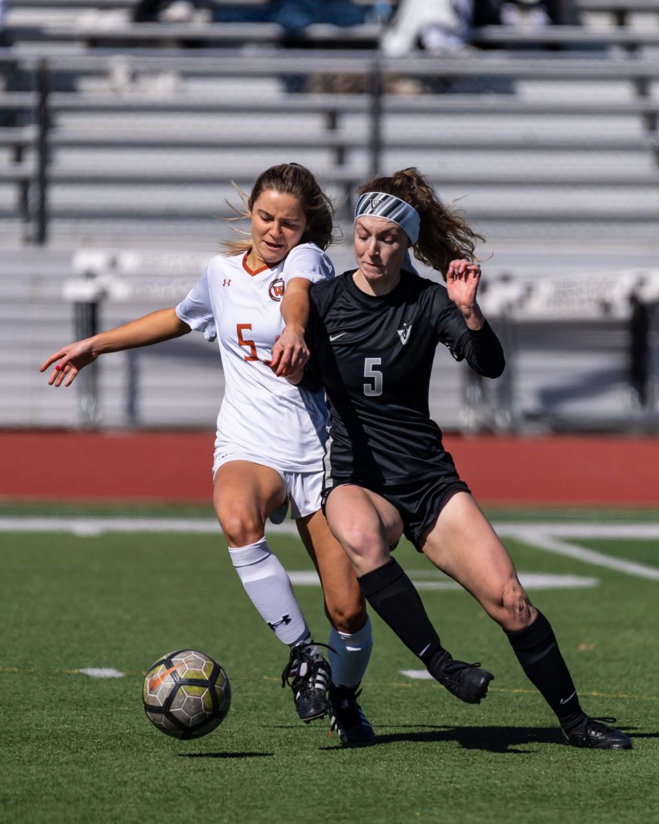 Westwood's Sarah Kolodzinski, left, and Vandegrift's Addie Carriere battle for possession in a scoreless draw between the District 25-6A rivals March 12. Both teams will compete in the UIL state playoffs which kick off Thursday.