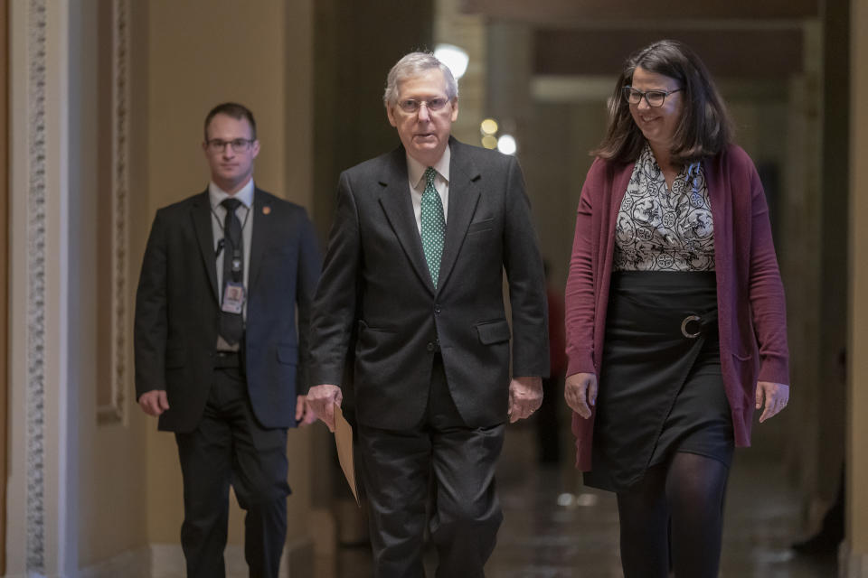 Senate Majority Leader Mitch McConnell, R-Ky., walks to the chamber on the morning after House and Senate negotiators worked out a border security compromise hoping to avoid another government shutdown, at the Capitol in in Washington, Tuesday, Feb. 12, 2019. (AP Photo/J. Scott Applewhite)