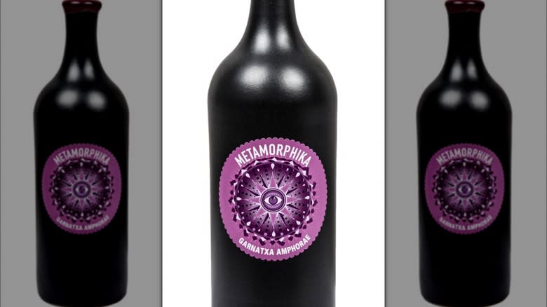 black wine bottle purple label