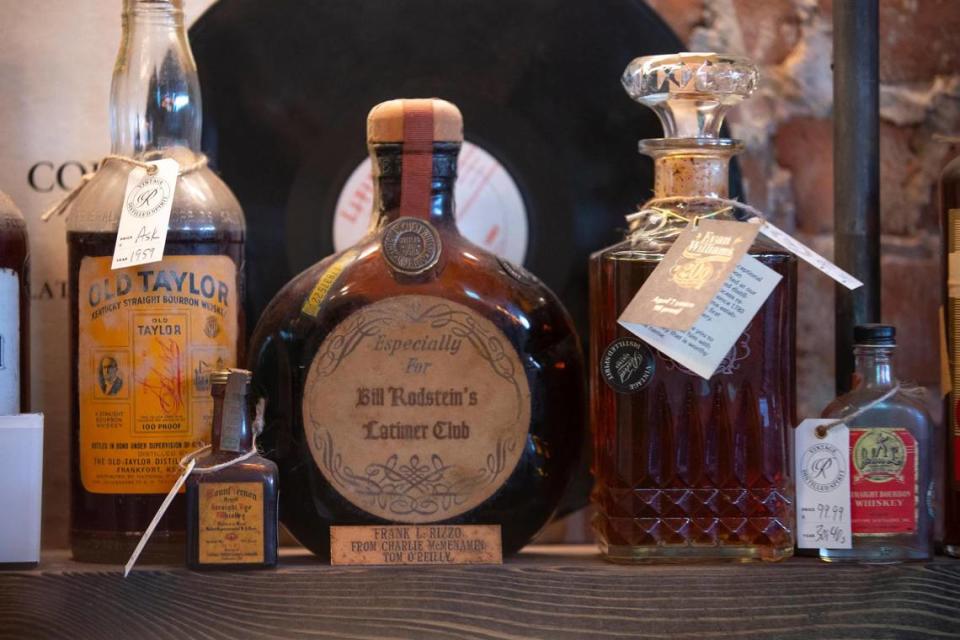 Vintage bottles of liquor, like some of these with a tax strip at Revival Spirits in Covington, are often sought after.