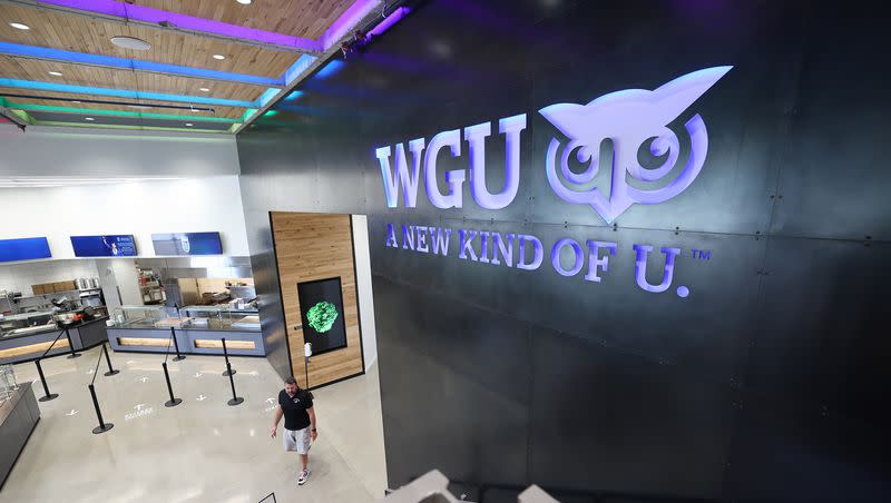 A person walks through the cafeteria at Western Governors University in Millcreek on Wednesday, Aug. 3, 2022, the school’s 25th anniversary.