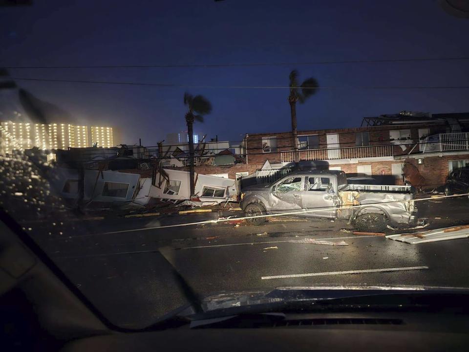 This photo provided by Bay County Sheriff's Office shows storm damage around around Panama City Beach, Fla., in Bay County, early Tuesday, Jan. 9, 2024. A sprawling storm has hit the South with strong thunderstorms and tornado warnings that blew roofs off homes and tossed about furniture in the Florida Panhandle and brought cities across the Midwest to a standstill with more than half of foot of snow. (Bay County Sheriff's Office via AP)