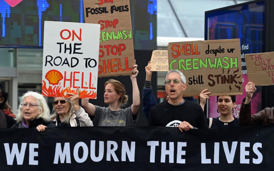 Climate protesters demonstrated against fossil fuel production at Shell&#39;s annual general meeting last month - ANDY RAIN/EPA-EFE/Shutterstock