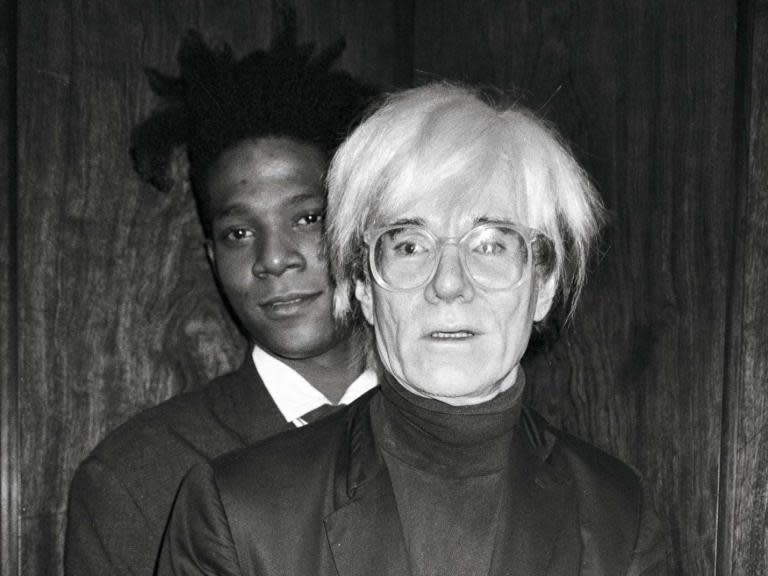 Andy Warhol and Jean-Michel Basquiat’s complex relationship captivated the art world then and now.At a time when Warhol was already world famous and the elder statesman of New York cool, Basquiat was a downtown talent rising rapidly from the graffiti scene.Together, they forged an electrifying personal and professional partnership.As a prolific documentarian of his own world, Warhol extensively photographed and wrote of his friendship with Basquiat, all played against the backdrop of 1980s downtown New York City. It reveals not only the emotional depth of their relationship but also its ambiguities, extremities, and complexities.Produced in collaboration with The Andy Warhol Foundation and Jean-Michel Basquiat’s estate, a new book chronicles the duo’s relationship in hundreds of previously unpublished photographs of Basquiat along with a dynamic cast of characters from Madonna to Grace Jones, Keith Haring to Fela Kuti.The shots are accompanied by entries from the legendary Andy Warhol Diaries, selected collaborative artworks, and extensive ephemera. Touching, intimate, and occasionally sardonic, Warhol on Basquiat is a voyeuristic glimpse into the lives of two of modern art’s brightest stars.Warhol’s unexpected death in 1987 took its toll on Basquiat, who was found dead from a heroin overdose the following year, aged 27.In 2017 his painting Untitled, a 1982 picture of a skull in oil stick, acrylic and spray paint, was sold for $110.5m (£85m). It broke the record for the most expensive at auction work of any US artist, as well as becoming the salesroom record for a black artist.“He’s afraid he’s just going to be a flash in the pan and I told him not to worry. He wouldn’t be.” – The Andy Warhol DiariesYou can purchase ‘Warhol on Basquiat: The Iconic Relationship Told in Andy Warhol’s Words and Pictures’ here