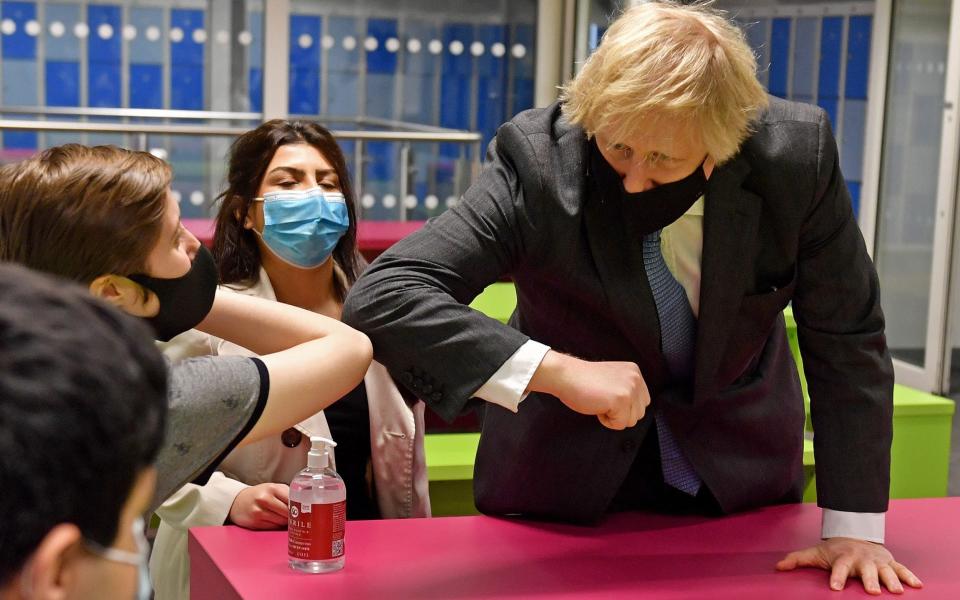 Prime Minister Boris Johnson meets Sixth Form students during a visit to the Accrington Academy - WPA Pool/ Getty Images Europe