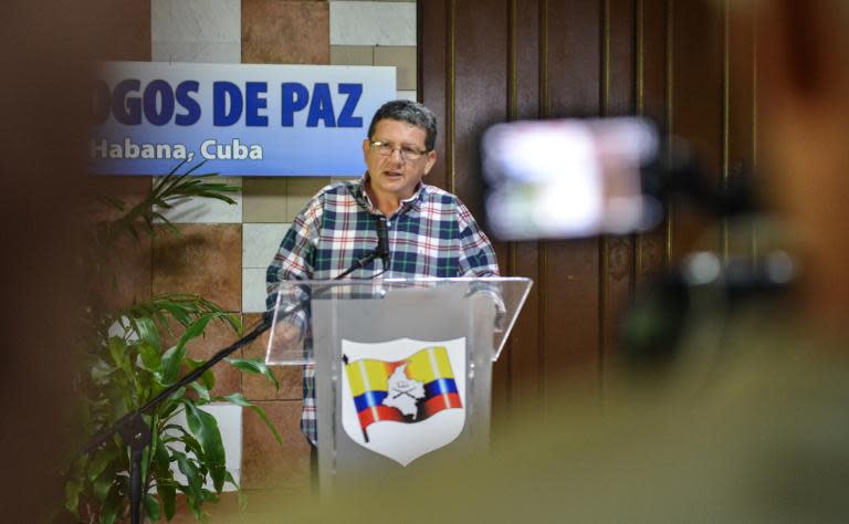 Rebel leader Pablo Catatumbo reads a statement during peace talks with the Colombian government at Convention Palace in Havana, on May 25, 2015