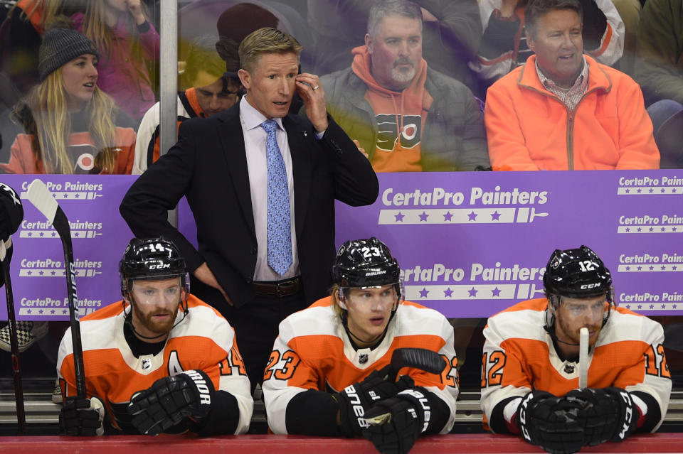 FILE - Philadelphia Flyers head coach Dave Hakstol is shown during an NHL hockey game against the Ottawa Senators in Philadelphia, in this Tuesday, Nov. 27, 2018, file photo. The Seattle Kraken hired Dave Hakstol on Thursday, June 24, 2021, as head coach of the expansion franchise that will begin its first NHL season in the fall. It’s his second NHL head-coaching job after three plus seasons with the Philadelphia Flyers from 2015-19. (AP Photo/Derik Hamilton, File)