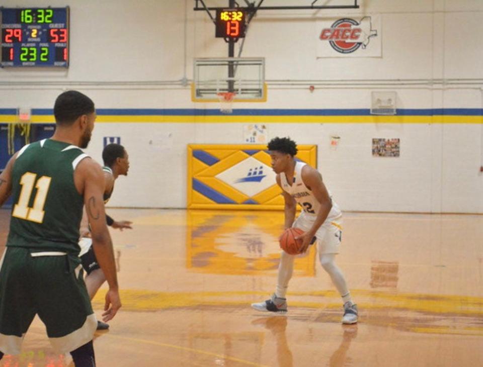 Chauncey Sterling playing basketball for Concordia College.