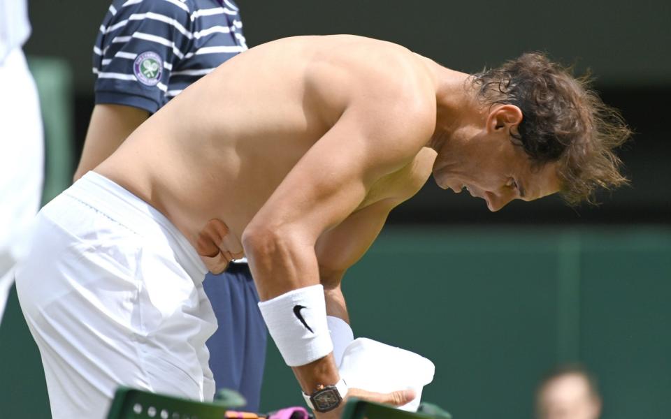 Nadal had to leave the court to have an abdominal injury treated - ALPHA PRESS