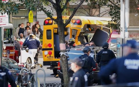 The school bus which was rammed in the attack - Credit: AP Photo/Bebeto Matthews