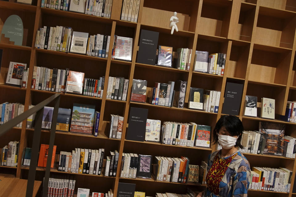 Books of Haruki Murakami are displayed at the university's new international house of literature as known as The Haruki Murakami Library at Waseda University Wednesday, Sept. 22, 2021 in Tokyo. The new literary center opening next month on the university campus is no ordinary kind. It's designed by renowned Japanese architect Kengo Kuma and featuring the world of Murakami and his works. (AP Photo/Eugene Hoshiko)