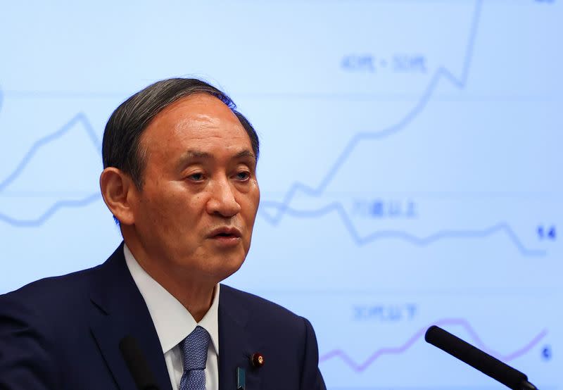 Japan's Prime Minister Yoshihide Suga attends a news conference on Japan's response to the coronavirus disease (COVID-19) outbreak, in Tokyo