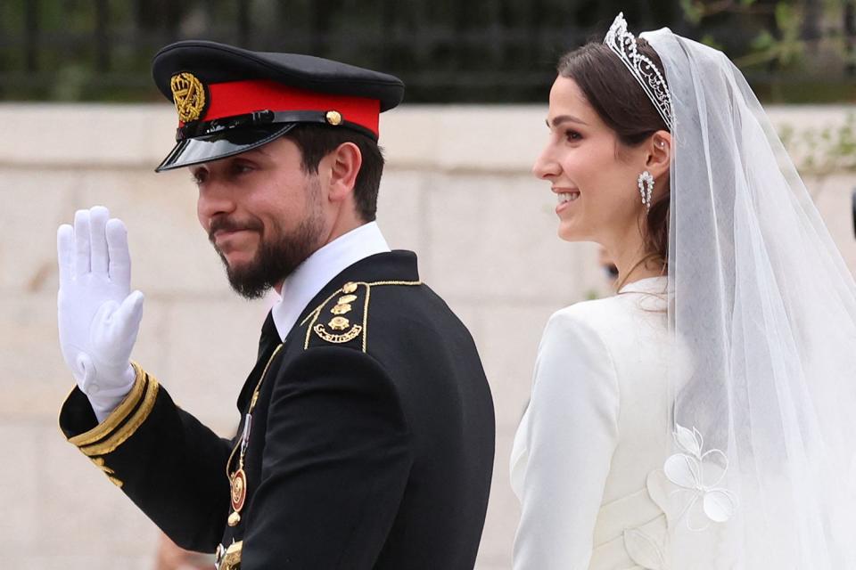 <p>KHALIL MAZRAAWI/AFP via Getty Images</p> Crown Prince Hussein and Princess Rajwa