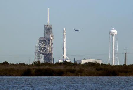 A SpaceX Falcon 9 rocket sits on the launch pad after being scrubbed due to a technical problem while due for a supply mission to the International Space Station from historic launch pad 39A at the Kennedy Space Center at Cape Canaveral, Florida, U.S., February 18, 2017. REUTERS/Mike Brown