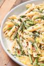 <p>The key to acing this dish is to cook the asparagus until its tips are crispy and stalks slightly blistered. The slight char will add a whole other dimension to the enticing flavour of this vegetable.</p><p>Get the <a href="https://www.delish.com/uk/cooking/recipes/a32247844/lemony-asparagus-pasta-recipe/" rel="nofollow noopener" target="_blank" data-ylk="slk:Lemon, Garlic And Asparagus Pasta;elm:context_link;itc:0;sec:content-canvas" class="link ">Lemon, Garlic And Asparagus Pasta</a> recipe.</p>