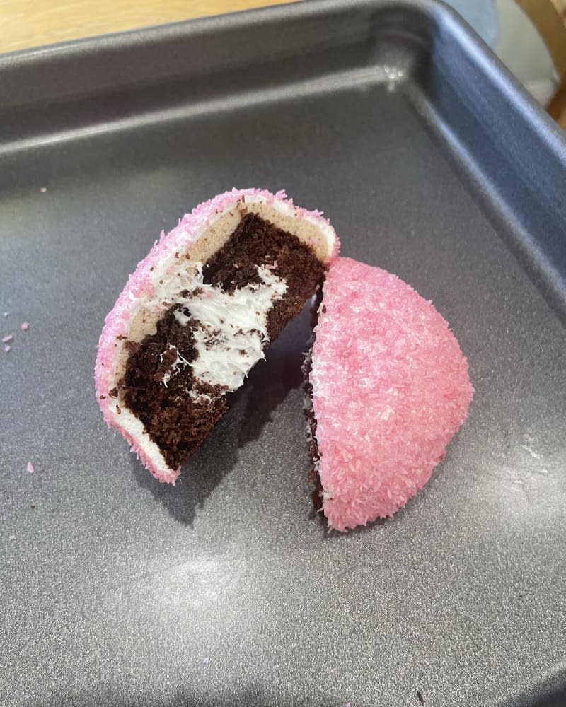 Snoball Hostess snack cut open on baking sheet