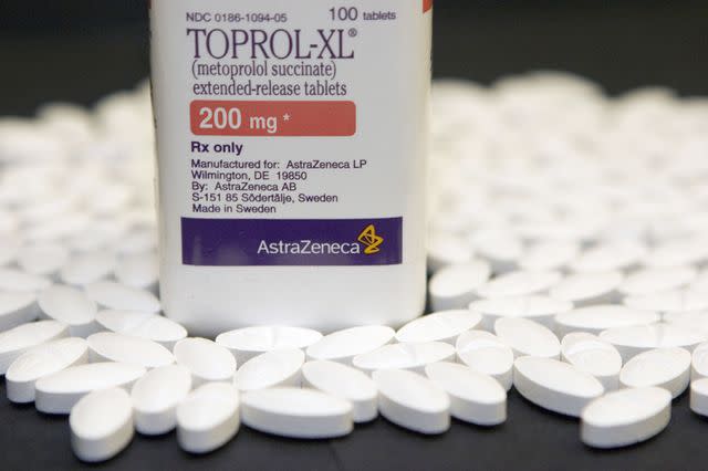 <p>Bloomberg / Contributor / Getty Images</p> 200 mg tablets of AstraZeneca's hypertension drug, Toprol-XL