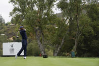 Tiger Woods hits from the 11th tee during the third round of the Zozo Championship golf tournament Saturday, Oct. 24, 2020, in Thousand Oaks, Calif. (AP Photo/Marcio Jose Sanchez)