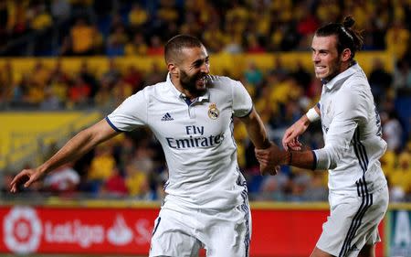 Football Soccer - Spanish Liga Santander - Las Palmas v Real Madrid - Gran Canaria stadium, Las Palmas de Gran Canaria, Spain - 24/09/16. Real Madrid's Karim Benzema (L) celebrates his first goal with his teammate Gareth Bale during the match. REUTERS/Juan Medina