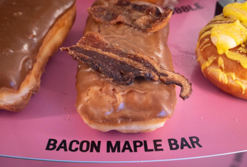 The Bacon Maple Bar doughnut, September 7, 2023, at Voodoo Doughnuts, 1324 S. Rural Road in Tempe, Arizona.