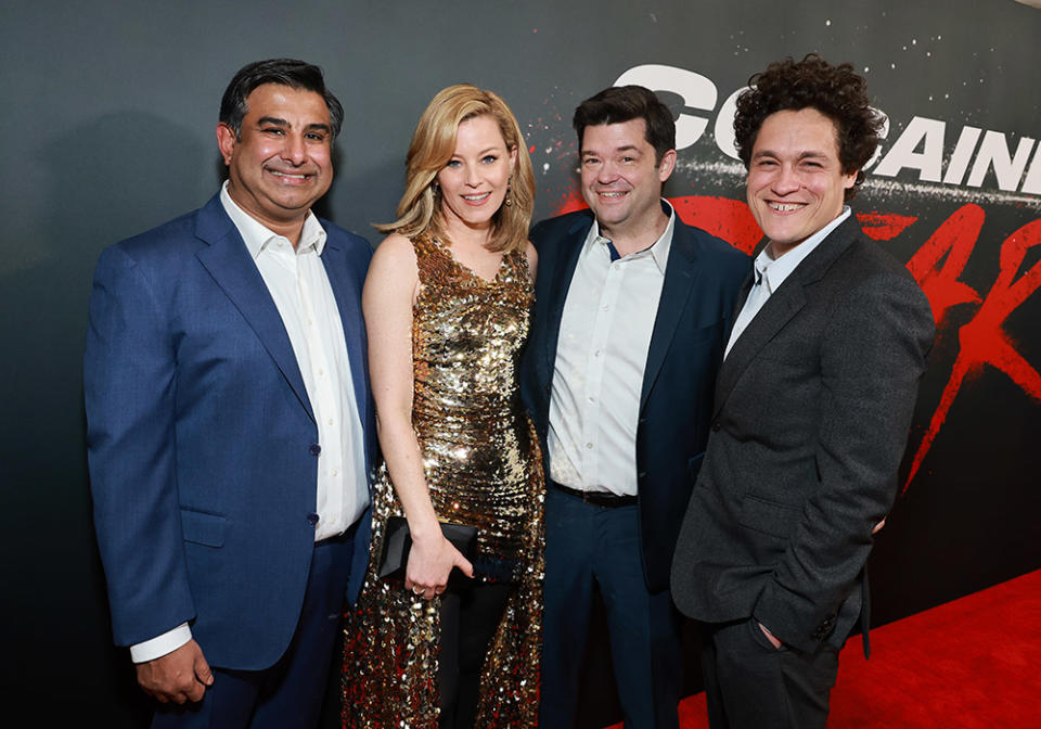 (L-R) Aditya Sood, Elizabeth Banks, Christopher Miller and Phil Lord attend the Los Angeles premiere of Universal Pictures' "Cocaine Bear" at Regal LA Live on February 21, 2023 in Los Angeles, California.