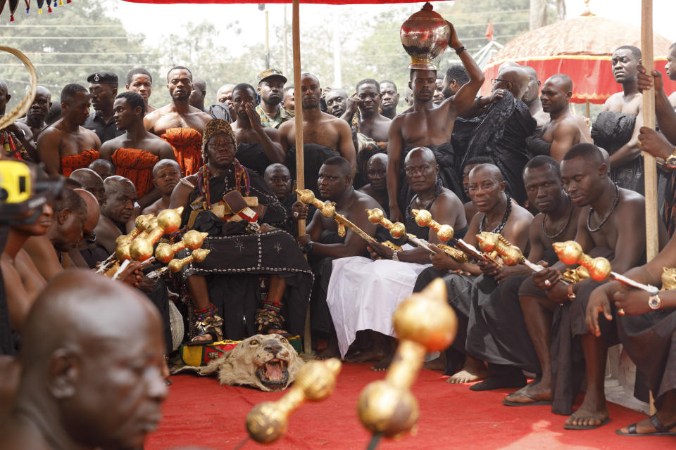 Asante King Otumfuo Osei Tutu II greets delegates from the Fowler museum at the Manhyia Palace in Kumasi, Ghana, Thursday, Feb. 8, 2024. Seven royal artifacts which were looted by British forces from Ghana's ancient Asante kingdom in the 19th century were returned by UCLA's Fowler museum, the latest of a series of stolen treasured items now being repatriated to several African countries. (AP Photo/Misper Apawu)