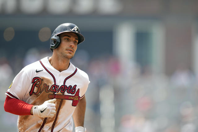 Atlanta Braves' Matt Olson (28) laughs with Michael Harris II (23