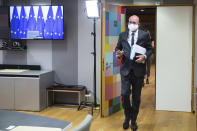 European Council President Charles Michel, wearing a protective face mask, arrives ahead of a video conference with German Chancellor Angela Merkel and Turkish President Recep Tayyip Erdogan at the European Council building in Brussels, Tuesday, Sept. 22, 2020. (Aris Oikonomou, Pool via AP)