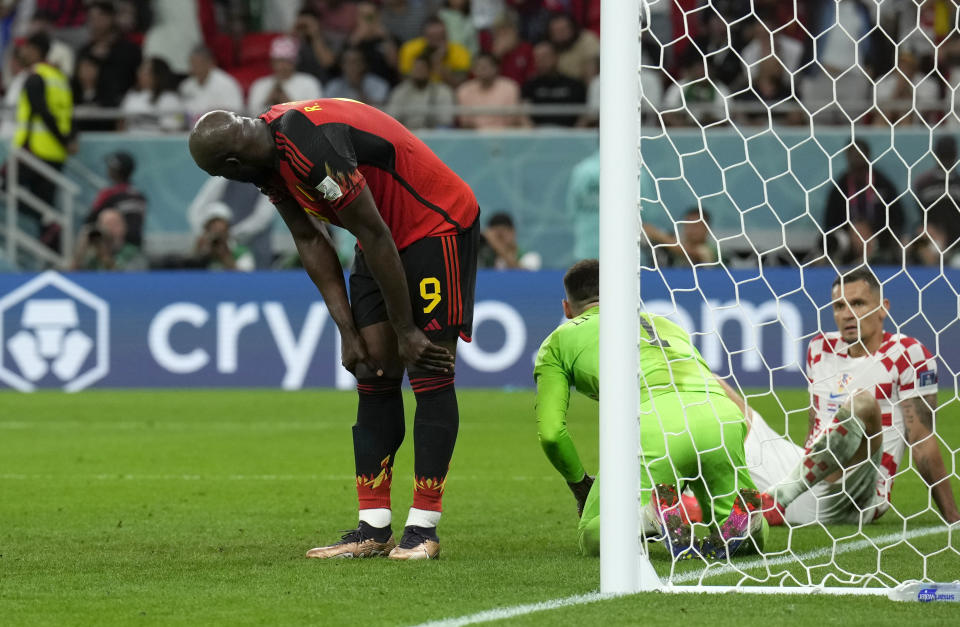 Belgium's Romelu Lukaku, left, reacts after missing a chance to score during the World Cup group F soccer match between Croatia and Belgium at the Ahmad Bin Ali Stadium in Al Rayyan, Qatar, Thursday, Dec. 1, 2022. (AP Photo/Francisco Seco)