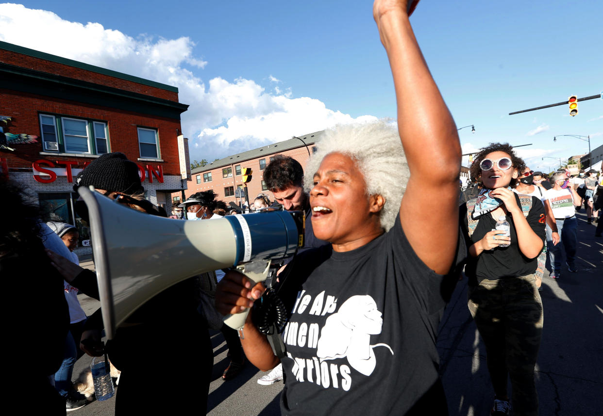 FILE - Cariol Horne marches during a protest organized by We Pump 716 and the Liberation Collective, on Sept. 4, 2020, in Buffalo. The Buffalo police officer was fired for pulling a fellow officer's arm from around the neck of a domestic violence suspect in 2006. In 2021, a state Supreme Court judge reinstated her pension and overturned her dismissal. (Sharon Cantillon/The Buffalo News via AP, File)