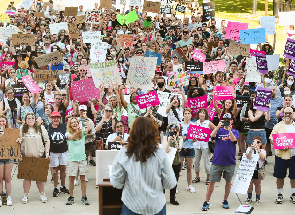 Michigan Gov. Gretchen Whitmer speaks to abortion-rights protesters during a demonstration in front of the state Capitol Building in Lansing, Mich., on June 24 in response to the U.S. Supreme Court's ruling overturning Roe v. Wade.<span class="copyright">Matthew Dae Smith—Lansing State Journal/Reuters</span>